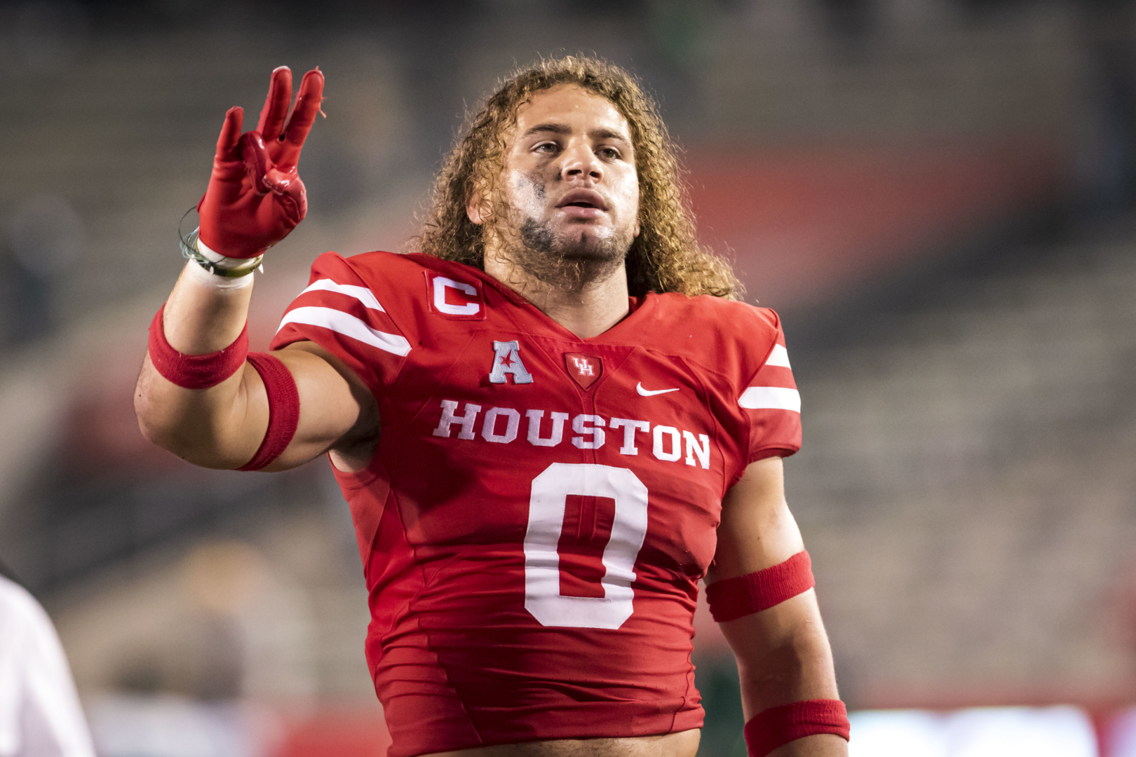 Senior linebacker Grant Stuard throws up the Cougar paw after UH's victory over Tulane | Courtesy of UH athletics
