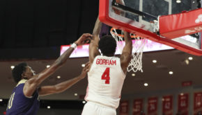 UH men’s basketball forward Justin Gorham throws down a two-handed slam over an Alcron State defender at Fertitta Center during the 2020-21 season. | Courtesy of UH athletics