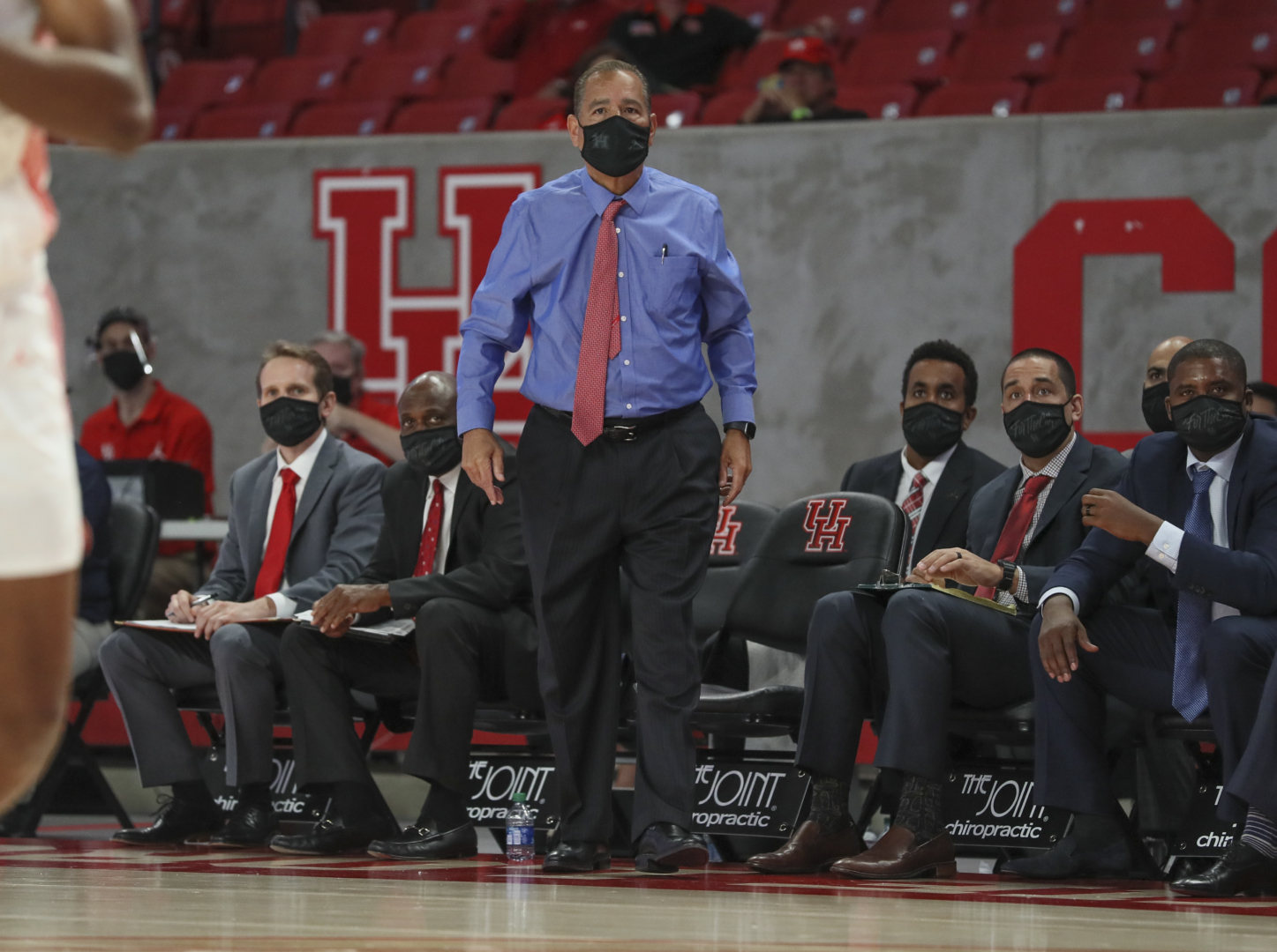 Kelvin Sampson watches his team from the bench | Courtesy of UH athletics