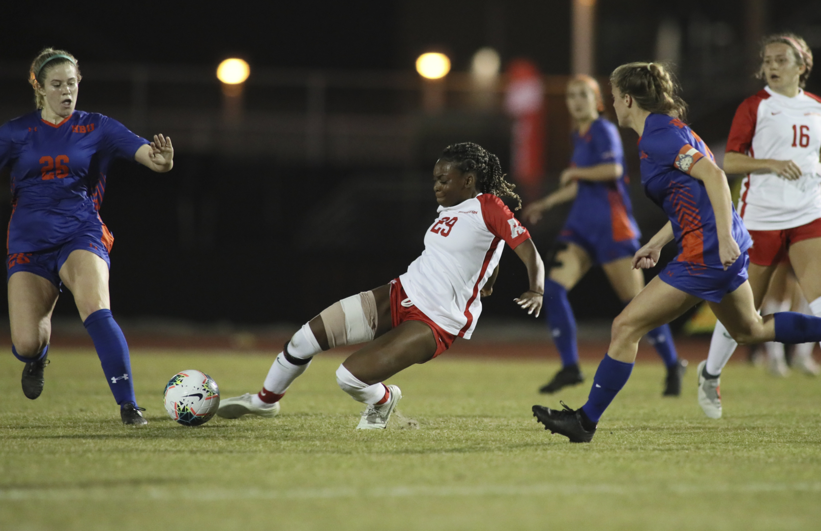 UH soccer redshirt junior forward Zionah Browne slides down with the ball within reach against Houston Baptist on Thursday at the Carl Lewis International Complex. | Courtesy of UH athletics.