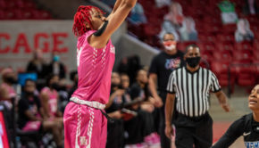 UH women's basketball guard Britney Onyeje releases a 3-point shot in a game against Memphis on Feb. 13 inside of the Fertitta Center. | Andy Yanez/The Cougar
