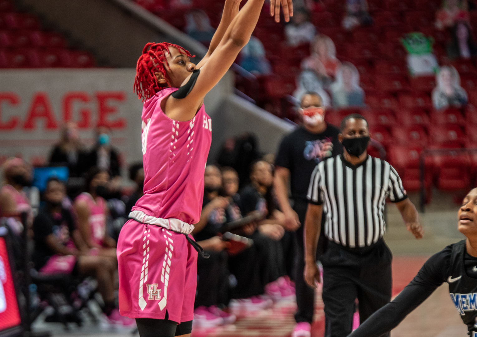UH women's basketball guard Britney Onyeje releases a 3-point shot in a game against Memphis on Feb. 13 inside of the Fertitta Center. | Andy Yanez/The Cougar