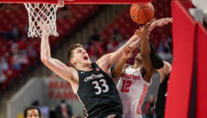 Houston guard Tramon Mark is fouled on a layup attempt by Cincinnati senior center Chris Vogt in Sunday's game at Fertitta Center. The UH basketball team dropped in the AP Poll following its loss to Wichita State. | Andy Yanez/The Cougar