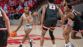 Houston men's basketball guard DeJon Jarreau attacks Western Kentucky center Charles Bassey during Thursday's game at Fertitta Center. | Andy Yanez/The Cougar