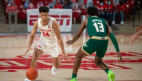Houston men's basketball guard Quentin Grimes attacks USF guard Justin Brown on Feb. 28 at Fertitta Center. UH will host Memphis this Sunday. | Andy Yanez/The Cougar