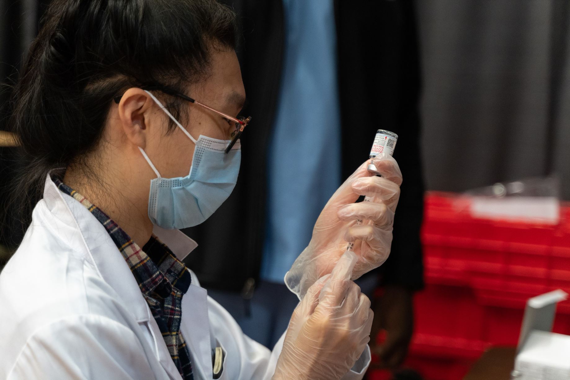At UH’s first on-campus mass vaccination event, an administrator prepares a dose of the Moderna COVID-19 vaccine. All Texas adults will soon be eligible for vaccination under new state guidelines. | Courtesy of UH