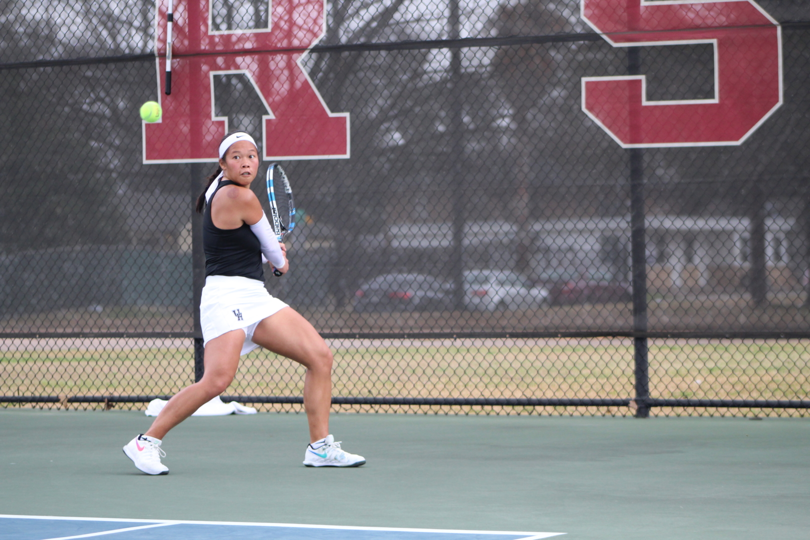 UH tennis senior Phonexay Chitdara locks in on the ball during a match for the Cougars. | Courtesy of UH athletics