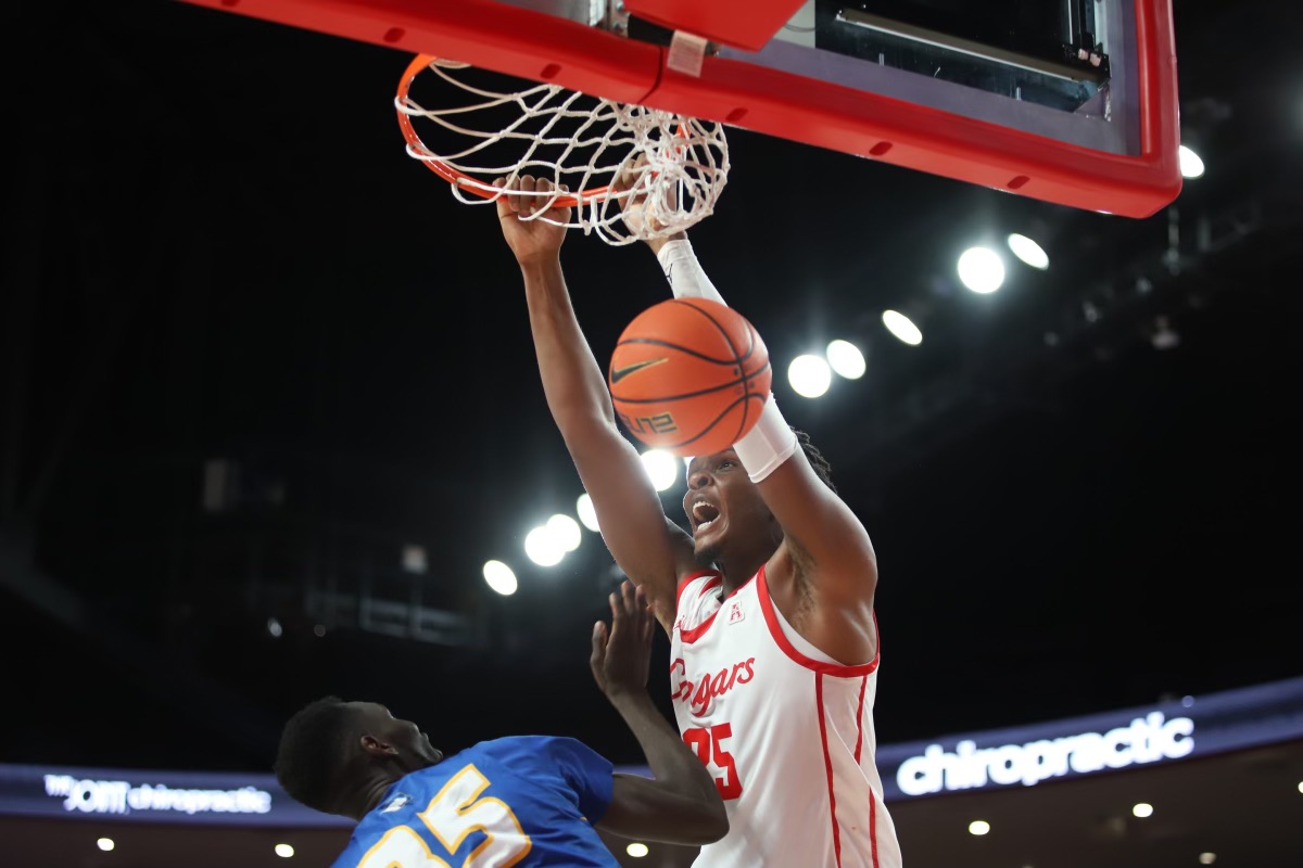 UH center Josh Carlton throws down a poster dunk in the first half against Hofstra on Tuesday night at Fertitta Center. | James Schillinger/The Cougar