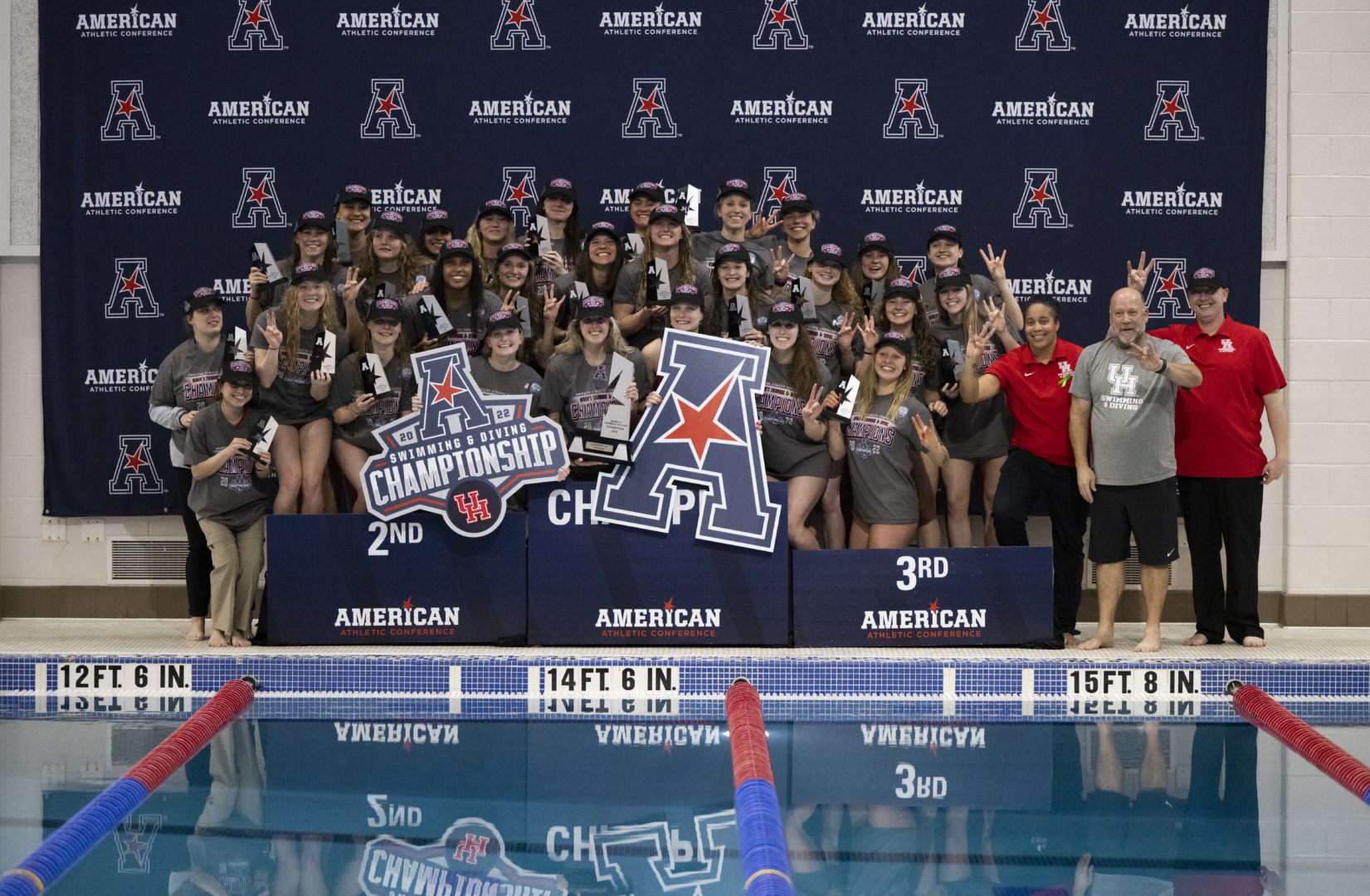 The UH swimming and diving team celebrates winning its sixth consecutive AAC Championship. | Courtesy of UH athletics
