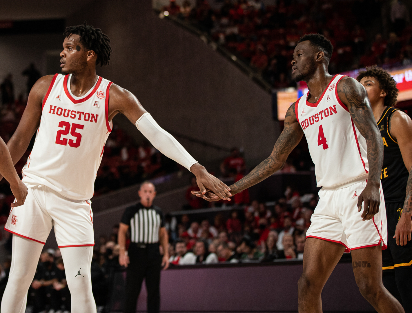 Josh Carlton and Taze Moore, who both transferred to UH this year, have played key roles in the Cougars' success over the course of the season. | Sean Thomas/The Cougar
