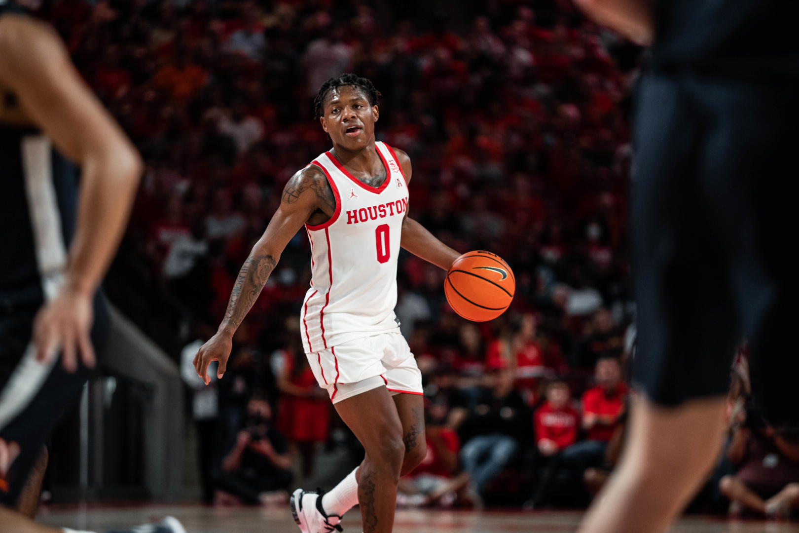 Marcus Sasser led UH in scoring, averaging 17.7 points per game, early in the 2021-22 season before suffering a season-ending foot injury in December. | James Schillinger/The Cougar
