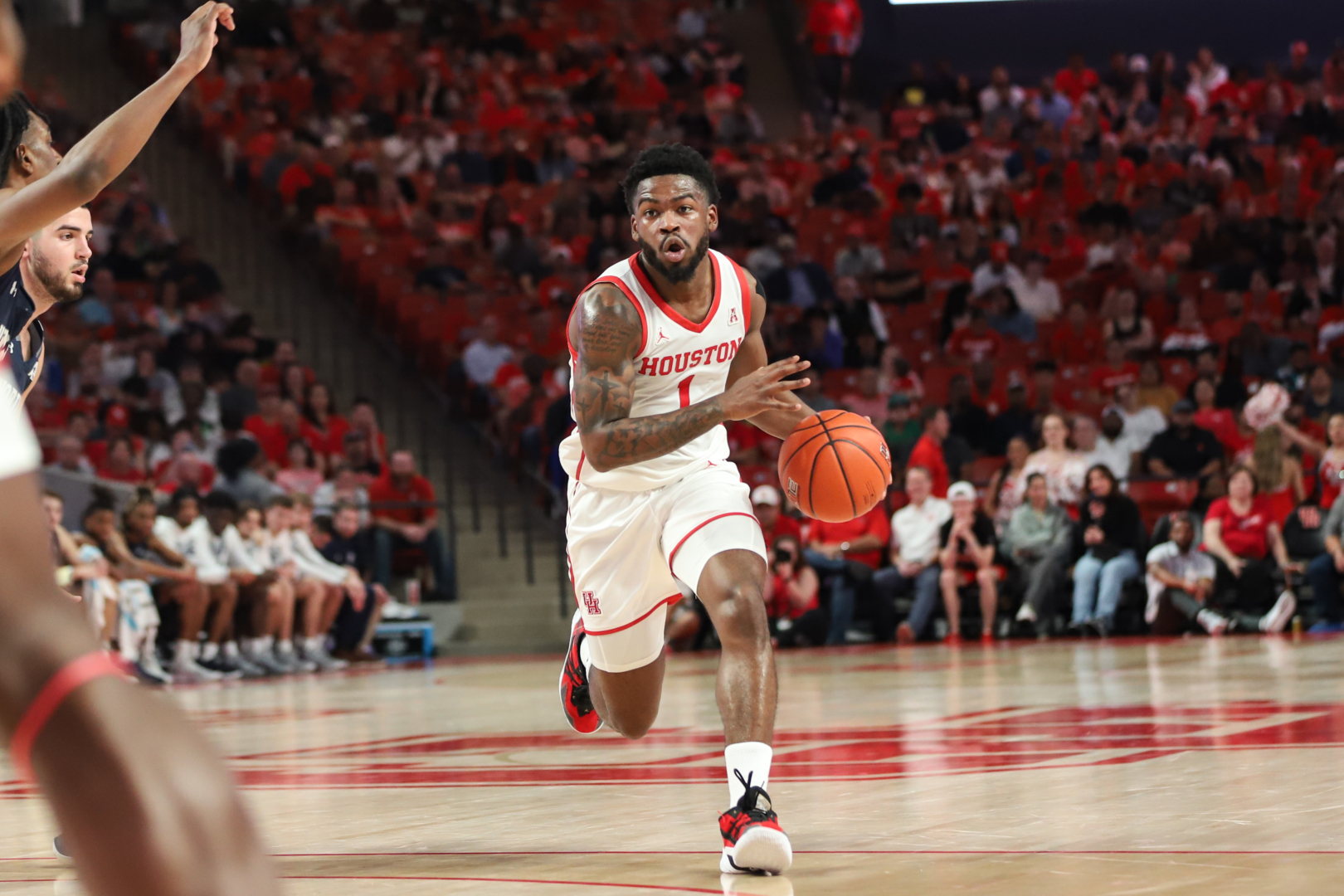 Junior point guard Jamal Shead leads UH with 56 assists through nine games this season. | Sean Thomas/The Cougar