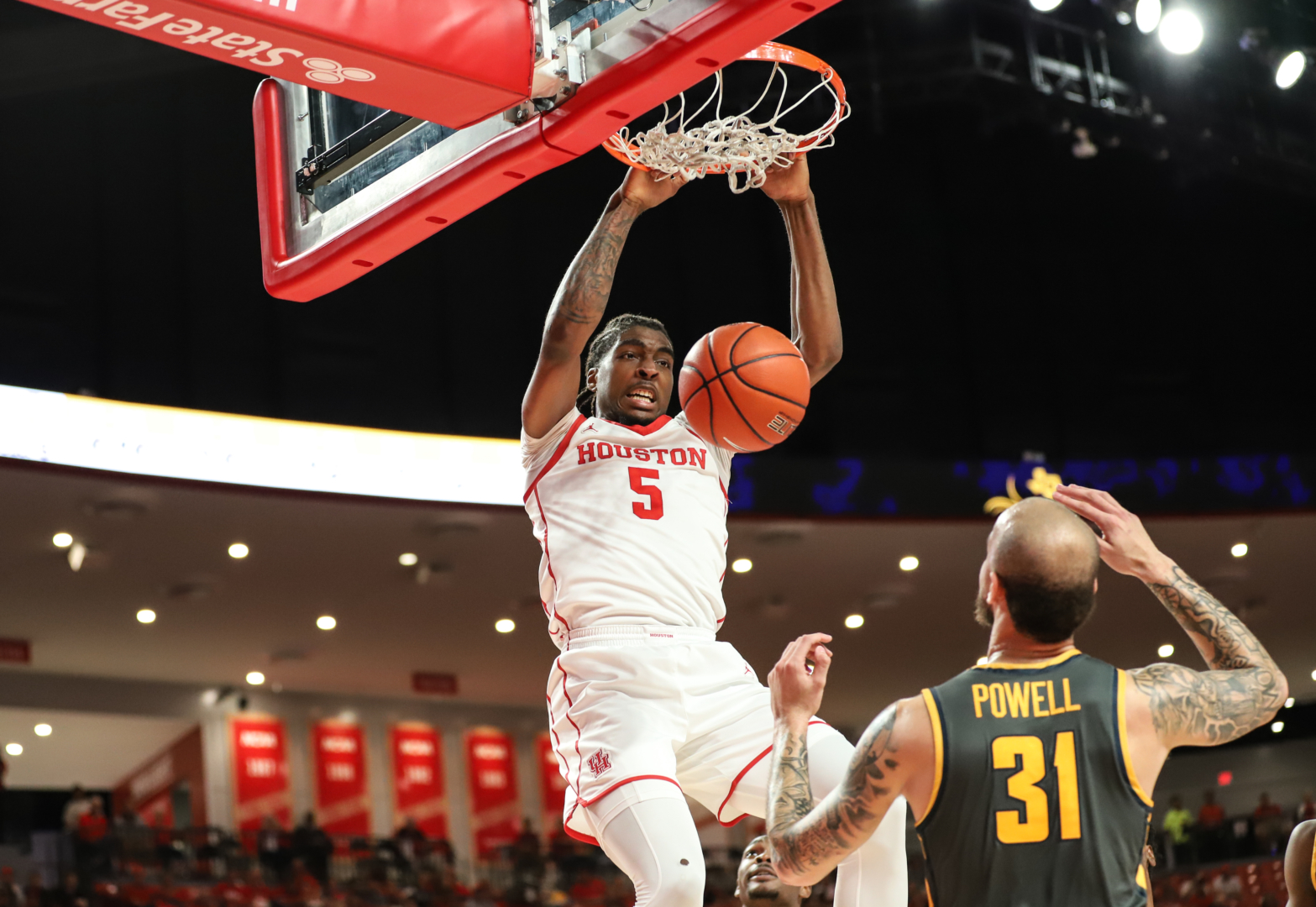 Ja'Vier Francis slams home one of his five first-half dunks in No. 5 UH's win over North Carolina A&T on Tuesday night at Fertitta Center. | Sean Thomas/The Cougar