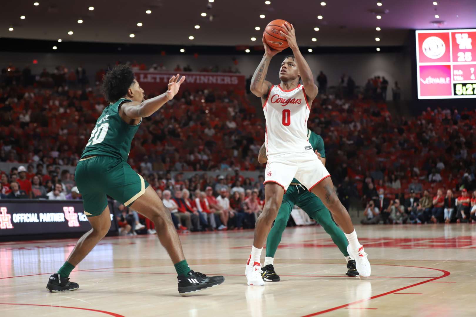 Marcus Sasser career-high 31 points powered UH past USF in its first game back at No. 1 in the AP poll. | Anh Le/The Cougar