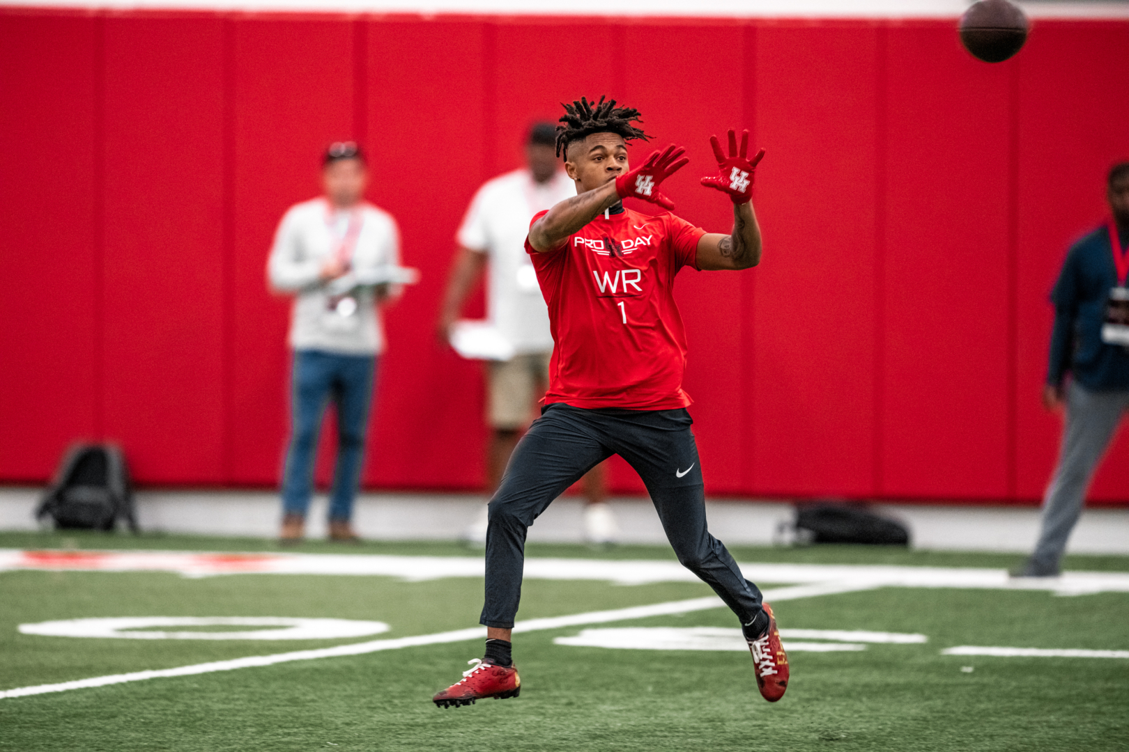 Tank Dell caught passes from Clayton Tune for likely the final time at the team's Pro Day. | Courtesy of UH Athletics