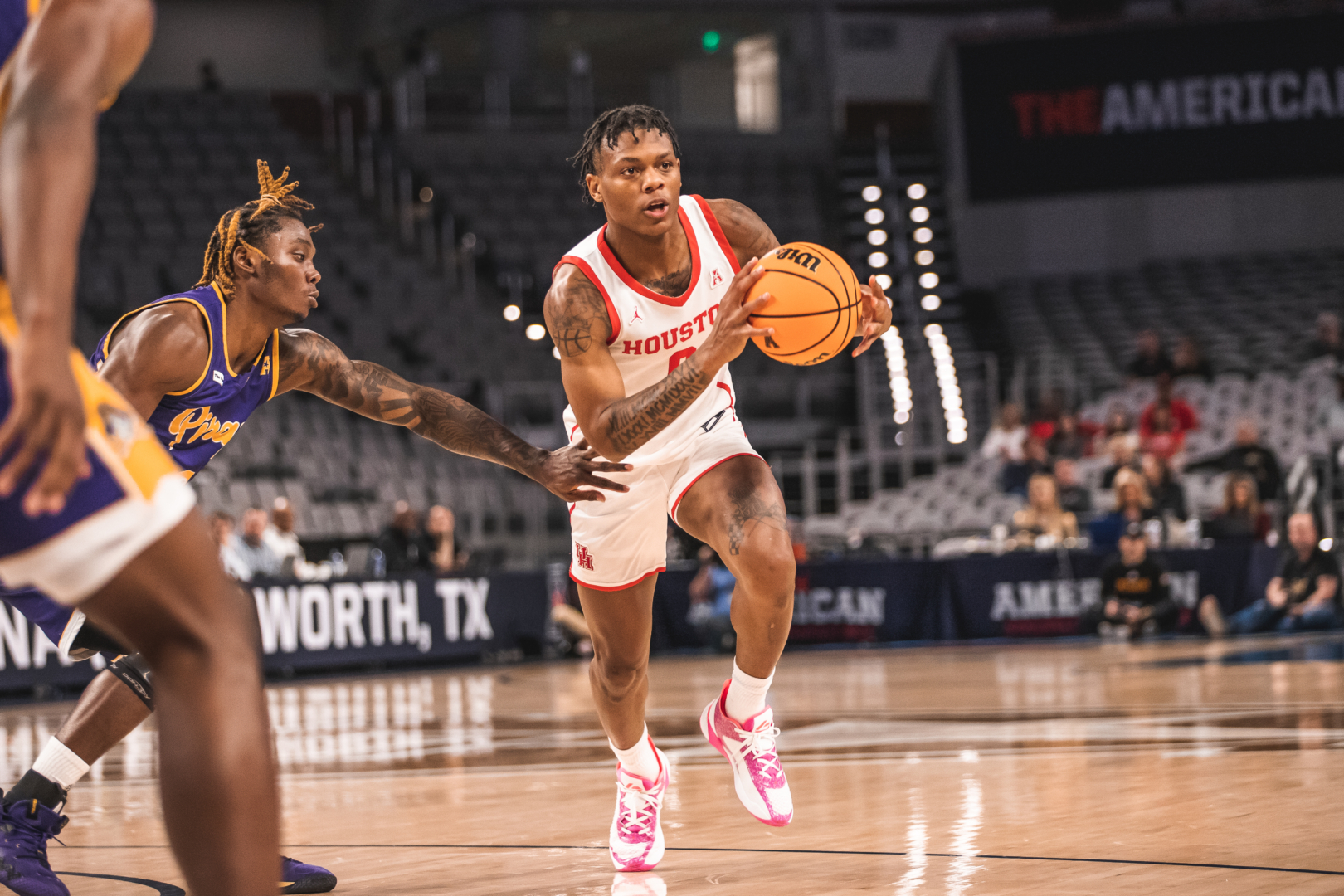 Marcus Sasser finished one-point shy of his career-high, scoring 30 in No. 1 UH's win over ECU in the AAC Tournament quarterfinals. | Sean Thomas/Sean.htxphoto