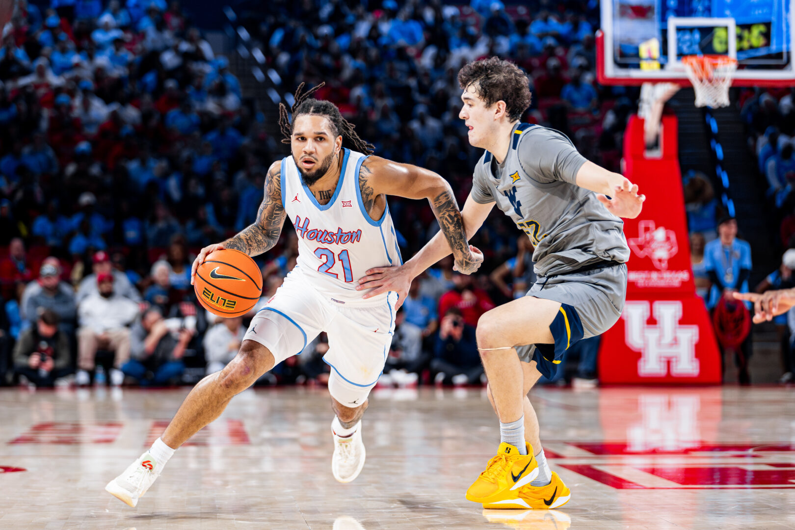 Cougars set the tone: No.7 Houston cruises past West Virginia 77-48