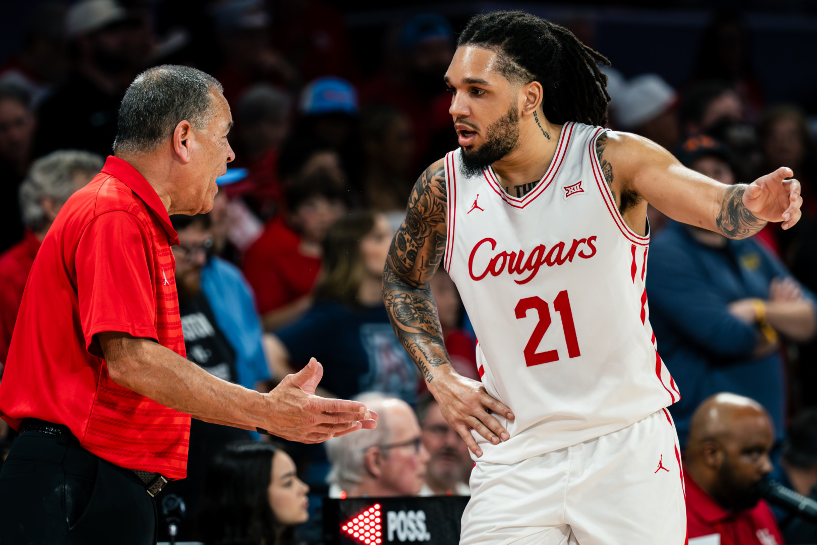 Burnt out: No. 14 Kansas upsets No. 5 Houston in crucial game